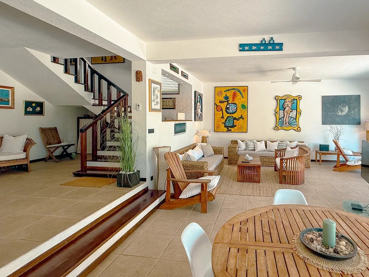 Bright Mediterranean interior with natural materials and curated artwork